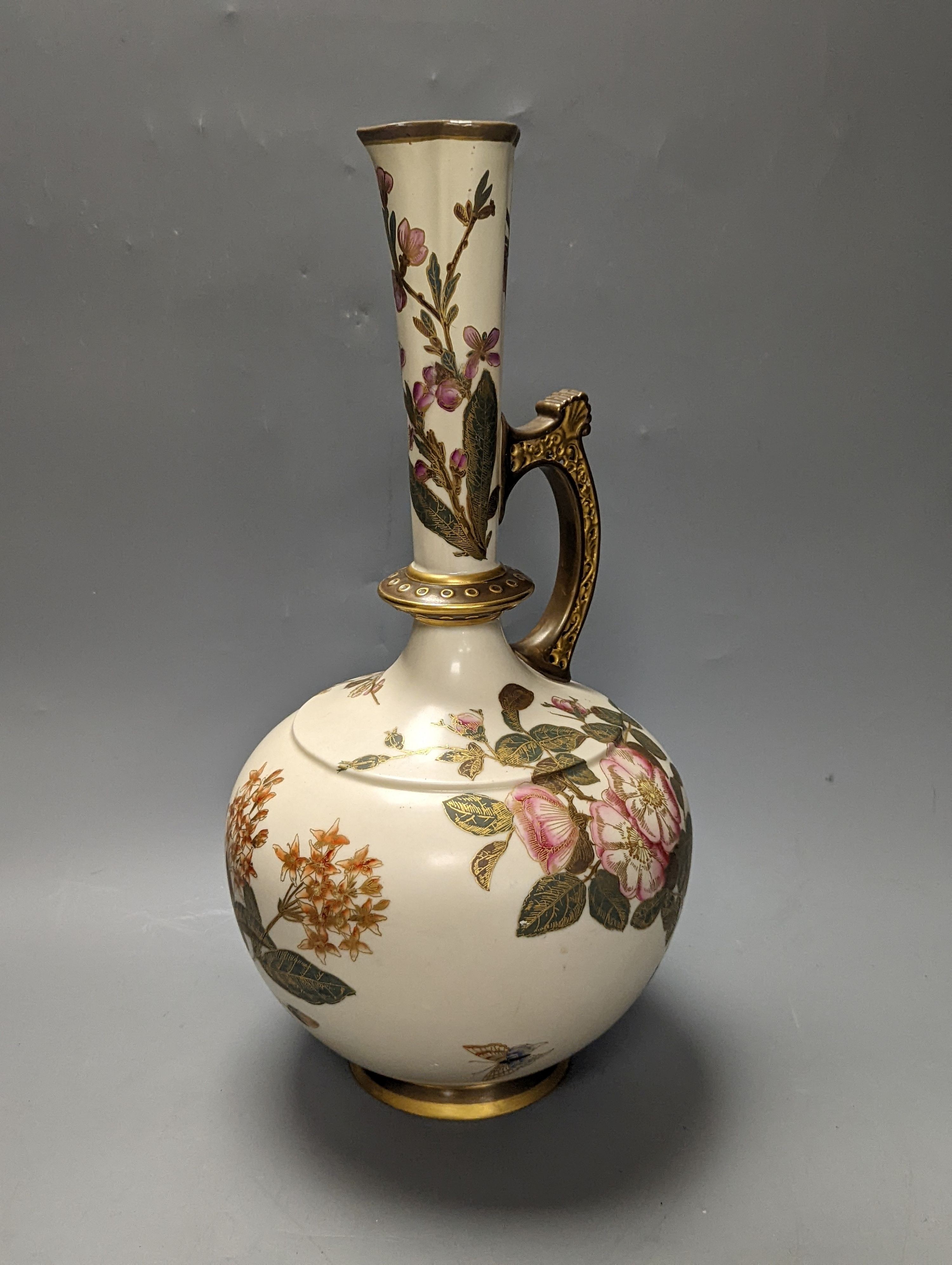 A Royal Worcester blush Ivory gilded floral ewer and a similar two handled vase 39cm